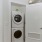 a closet with a washer and dryer