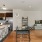 a kitchen with a table and chairs