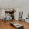 a living room with a tv and couches