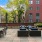 a courtyard with tables and chairs