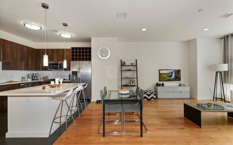 a kitchen with a table and chairs