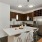 a kitchen with a table and chairs