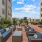 a courtyard with couches and tables