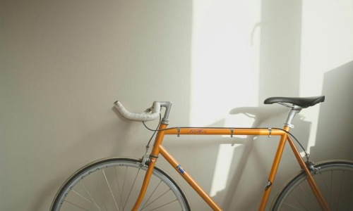 Find your perfect fit at The Artisan Series a bicycle parked in a room